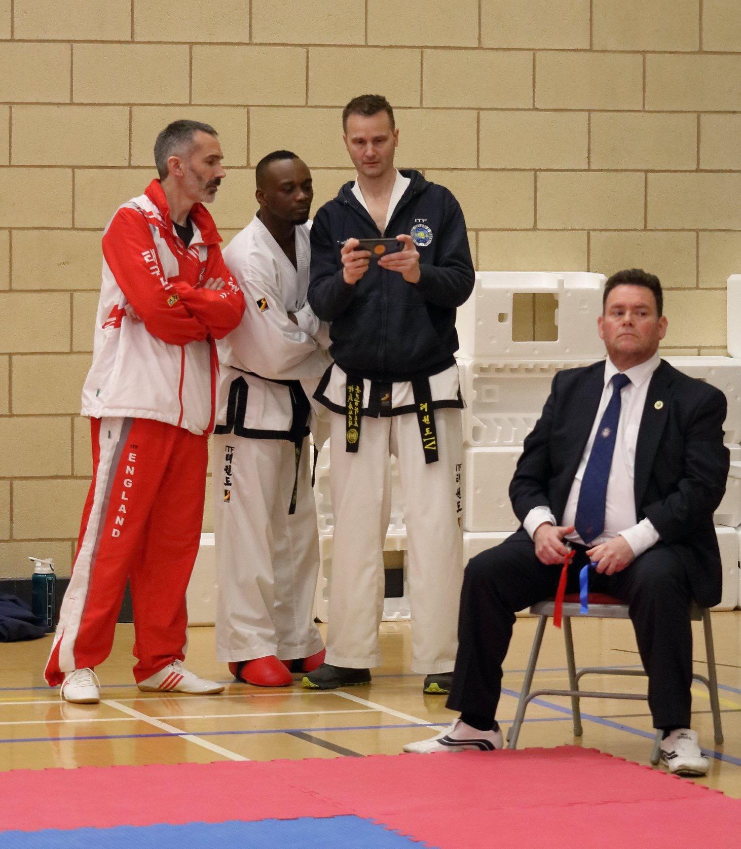 Reviewing the video evidence with Steve Millis (England Coach) and Billy Illaya Coaches and competotors review video evidence of a sparring match