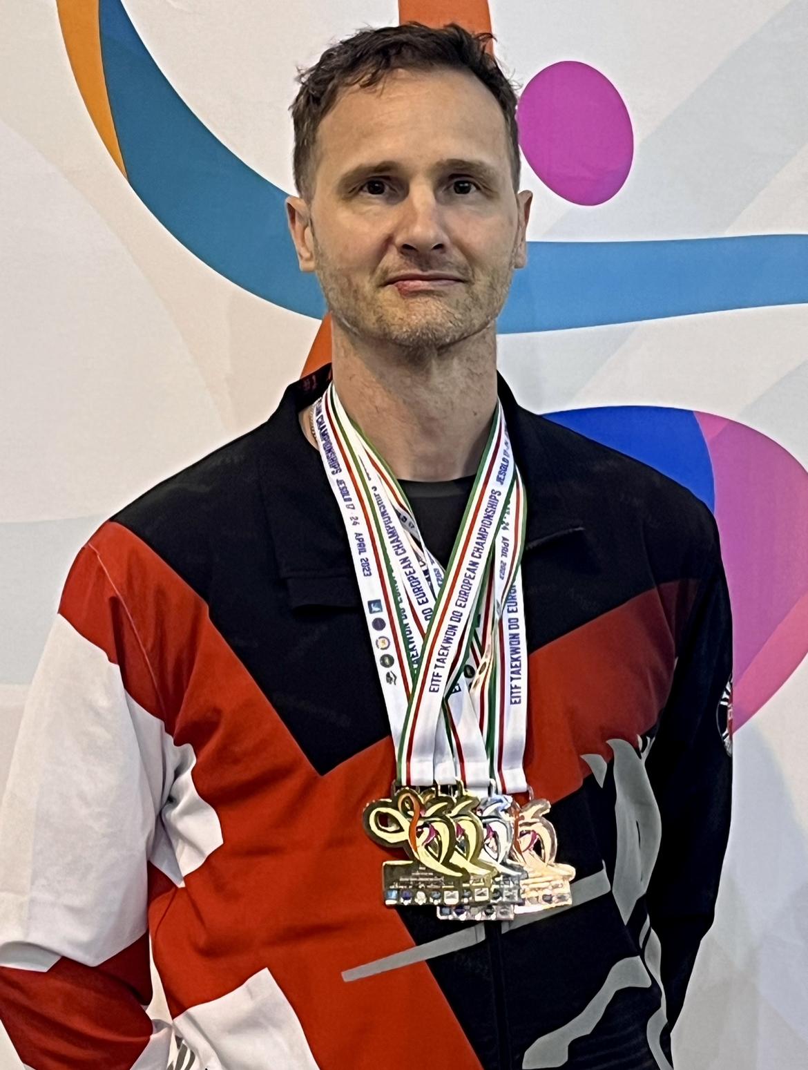 IMG_6197 Reuben Thorley with the medals achieved at the 2023 EITF European Championships in Rimini, Italy.